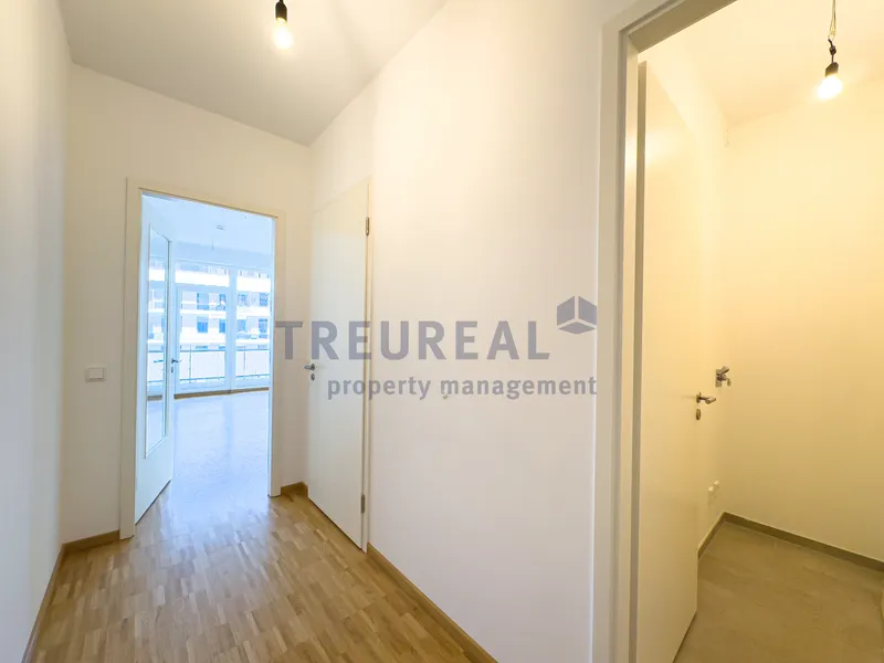 Kompakt, modern, durchdacht: 1-Zimmer-Neubauwohnung mit Balkon zum Innenhof — photo 1